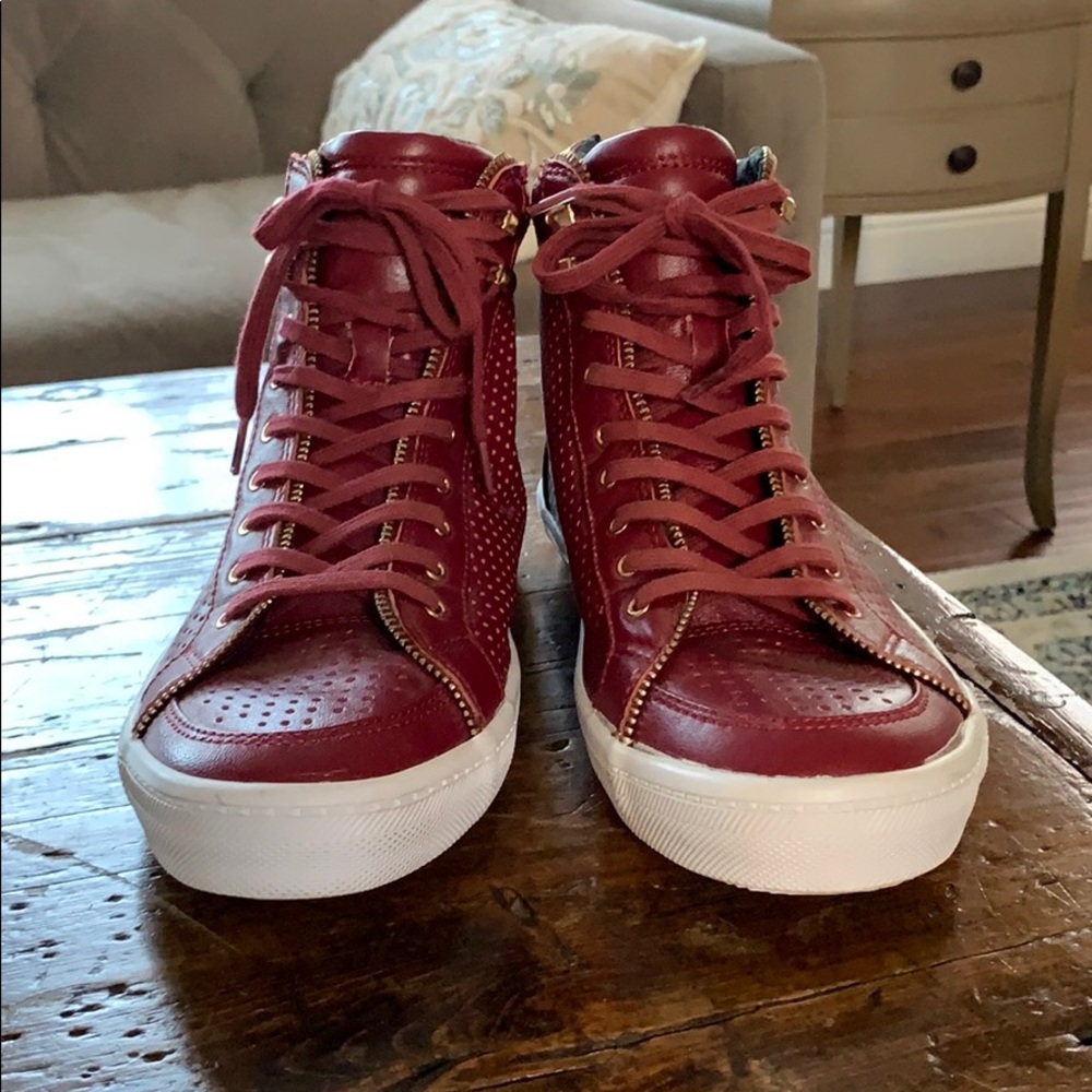 Red leather high top sneakers